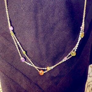 Silver and multicolored crystals necklace.